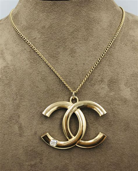 chanel necklace cc logo replica|chanel cc logo necklace gold.